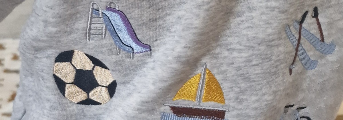 Broderie sur sweat d'un petit garçon